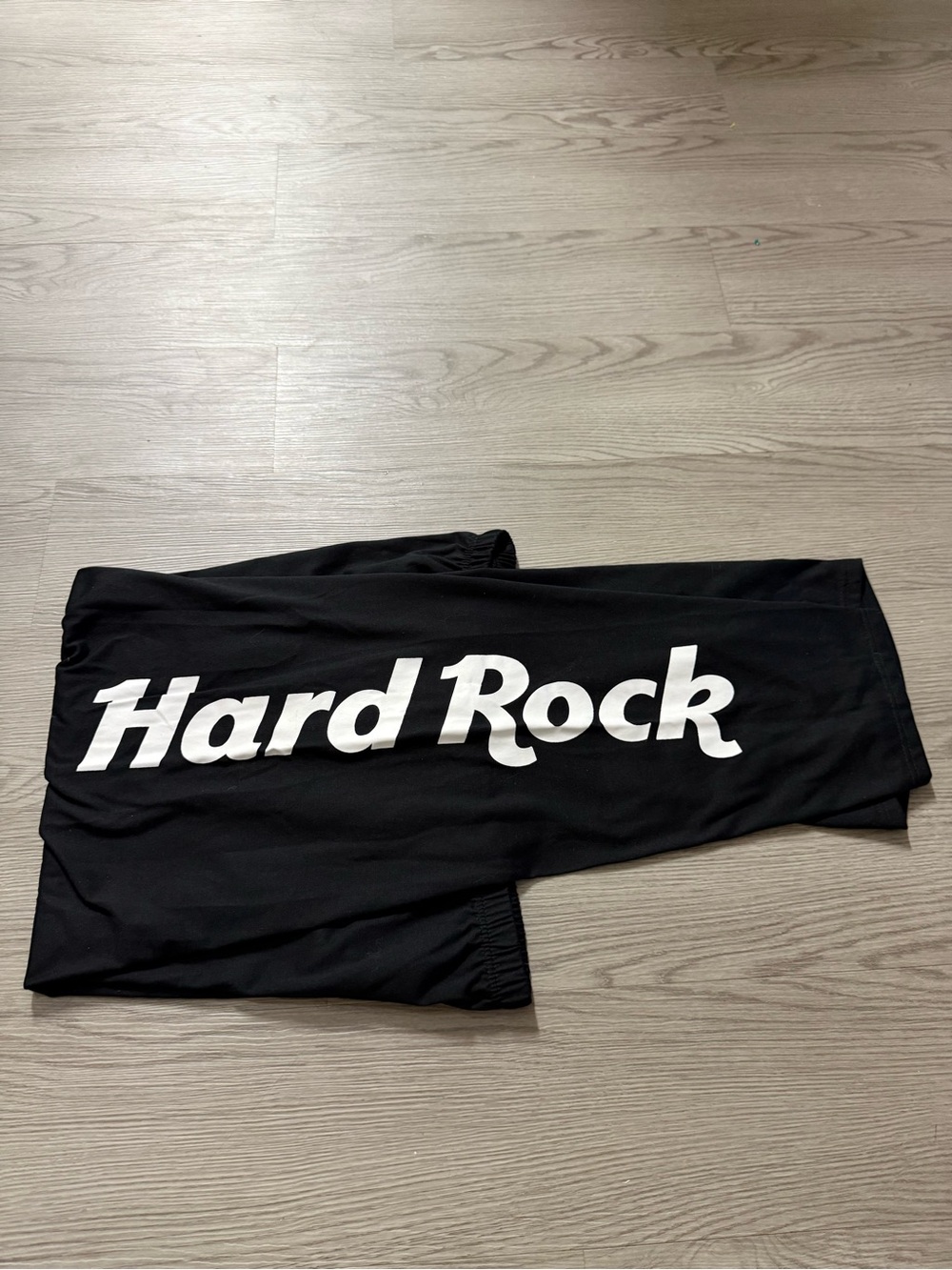Unisex  black Hard Rock joggers feature a large vertical logo Size 2XL